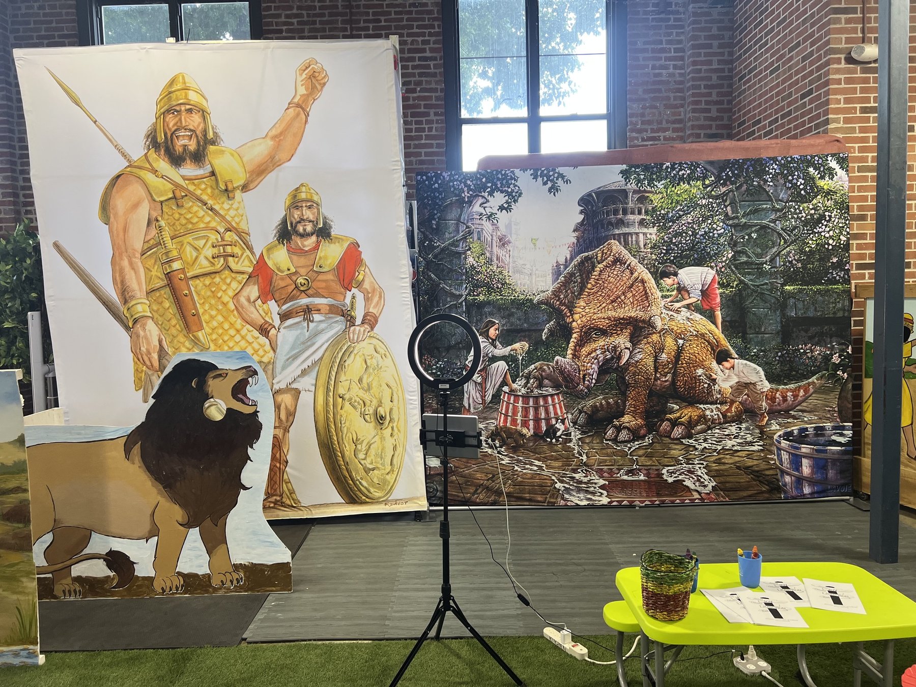 Photo booth kiosk with dinosaur backdrop at the Illinois State Fair